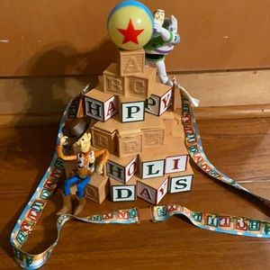 Toy story popcorn bucket holiday Disneyland exclusive. Pixar ball lights up.